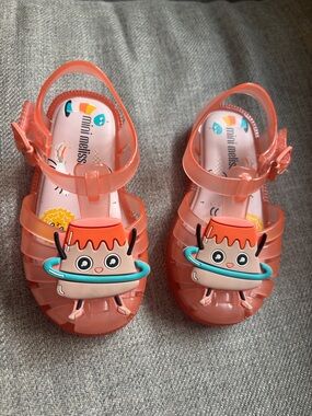 Mini Melissa Coral Pink Jelly Kids Sandals with Playful Character